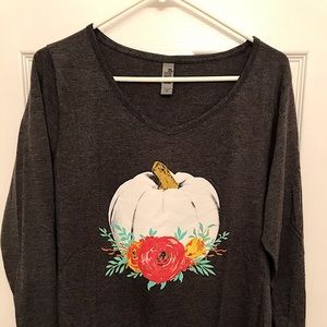 Women’s Boutique Fall long sleeve t-shirt, with white pumpkin.